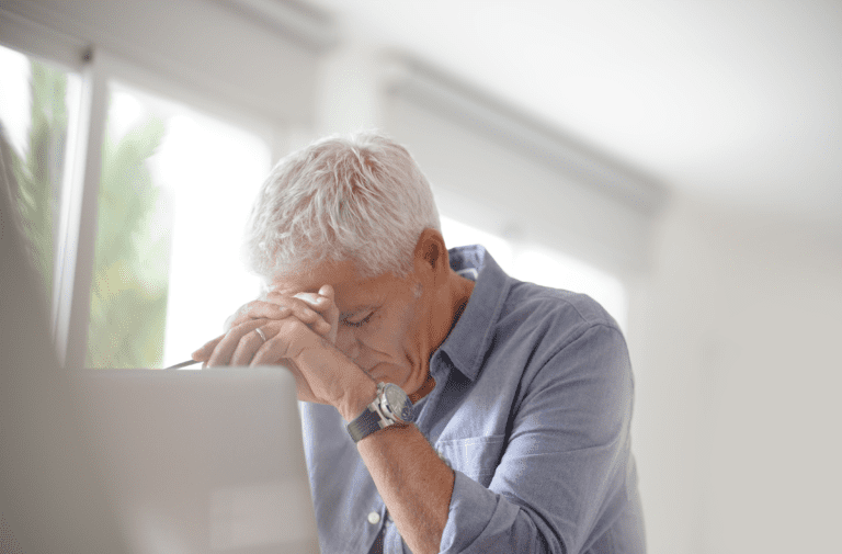 A photo of a professional worker experiencing burnout